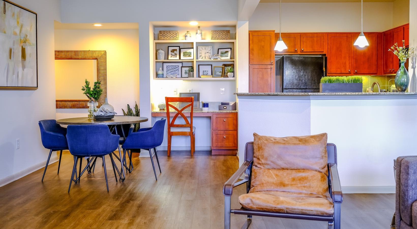 Generous living spaces to relax and unwind a kitchen with a dining table and chairs