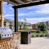 grilling area with seating close by