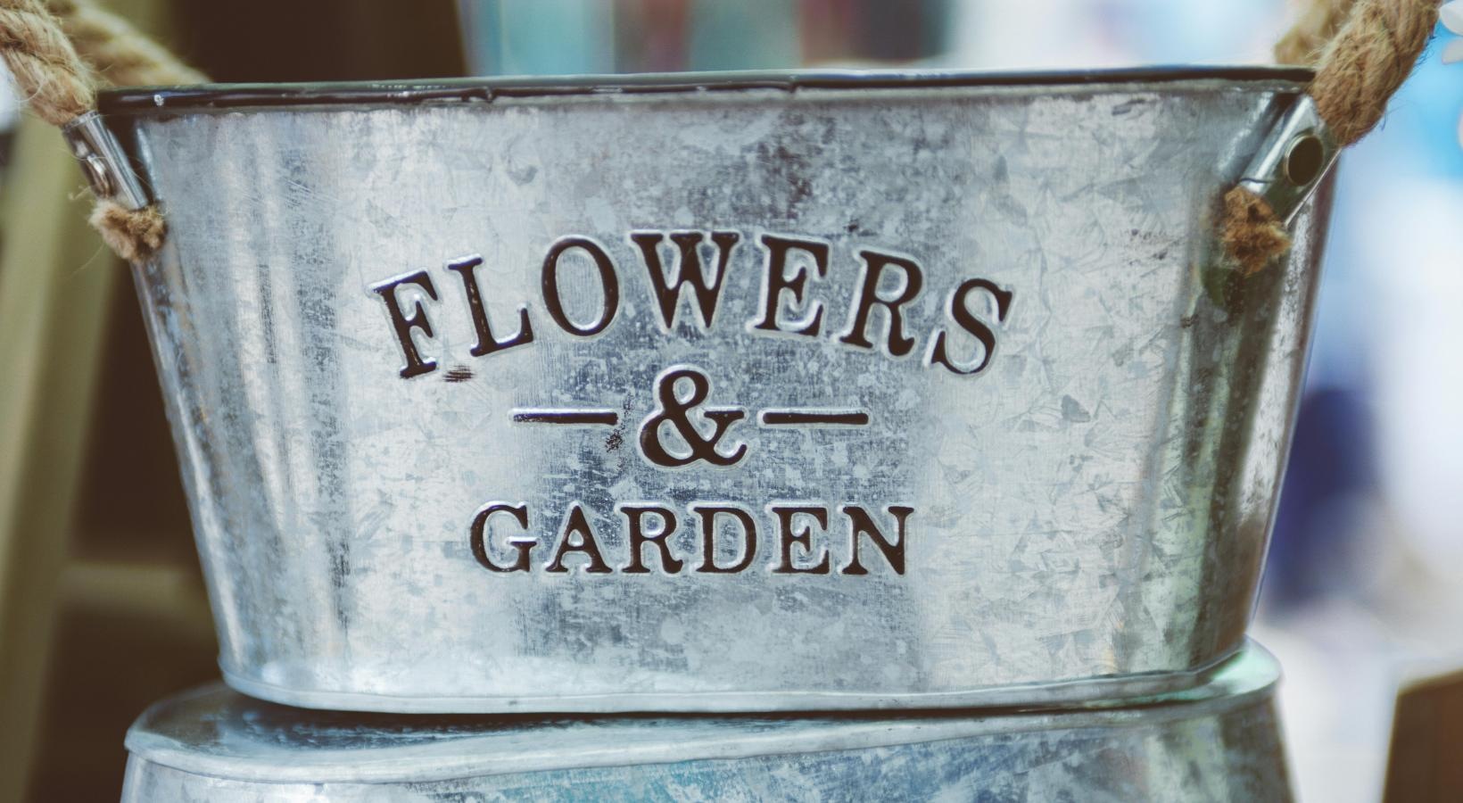 Settle into comfort at The Falls at Copper Lake text on a garden pot