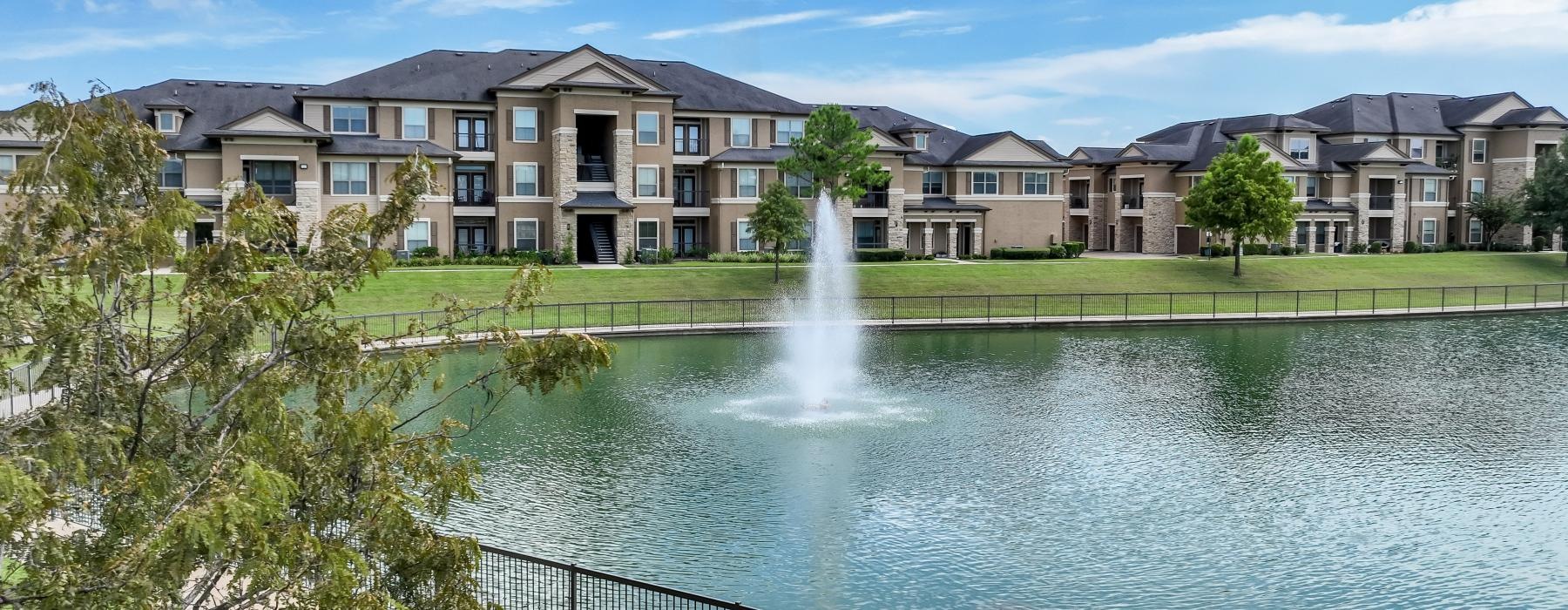 a fountain in a pond