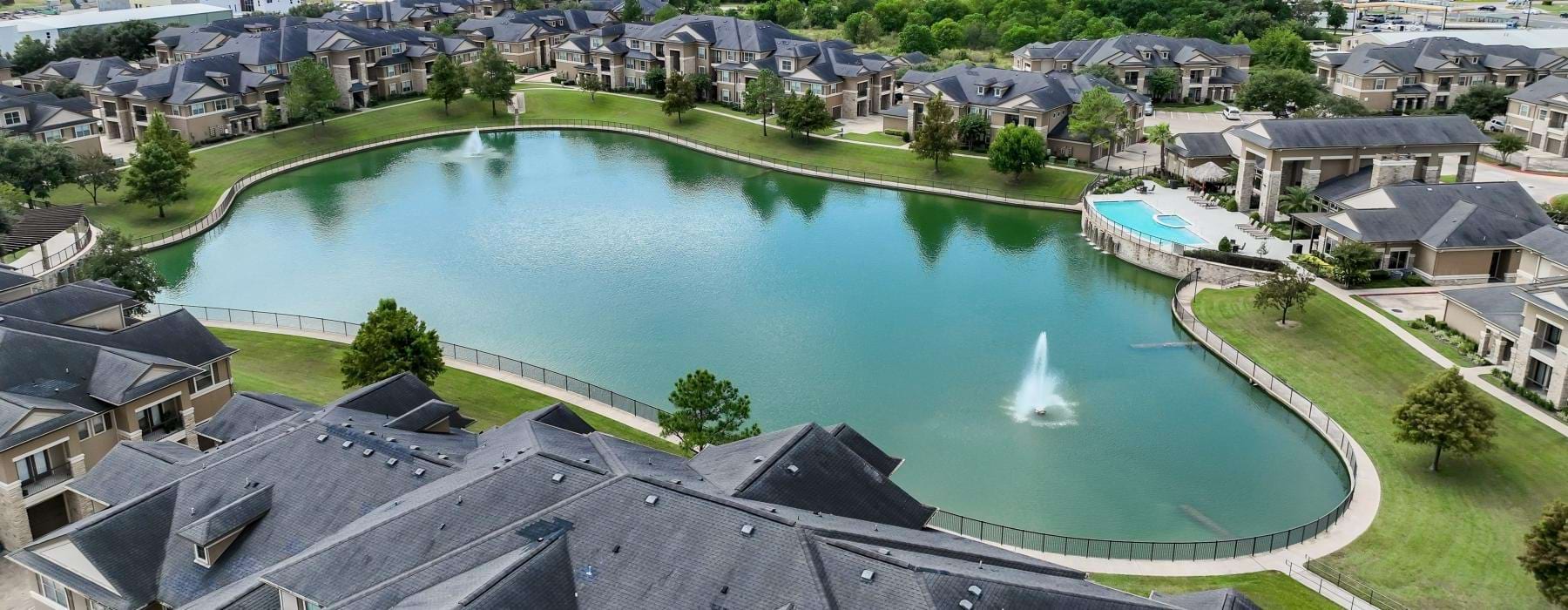 a pool of water surrounded by buildings