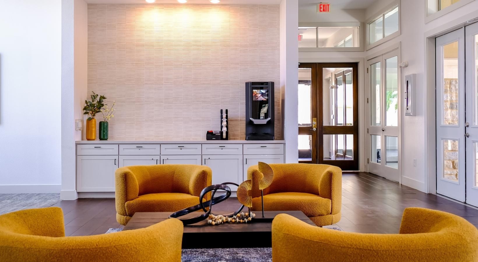 Settle into comfort at The Falls at Copper Lake a large room with yellow couches