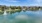 a body of water with buildings in the background